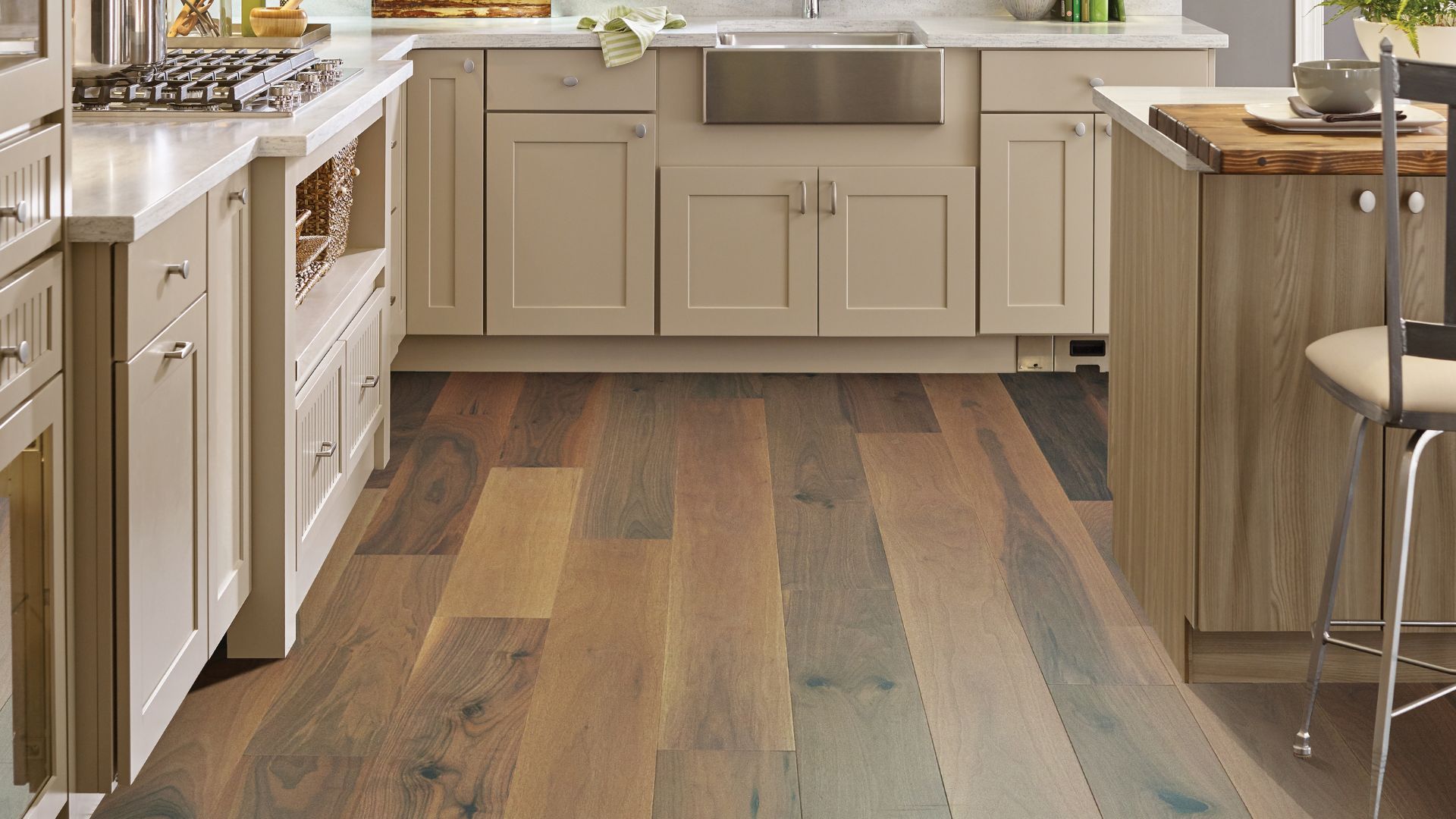rustic wide planked hardwood flooring in a bright kitchen